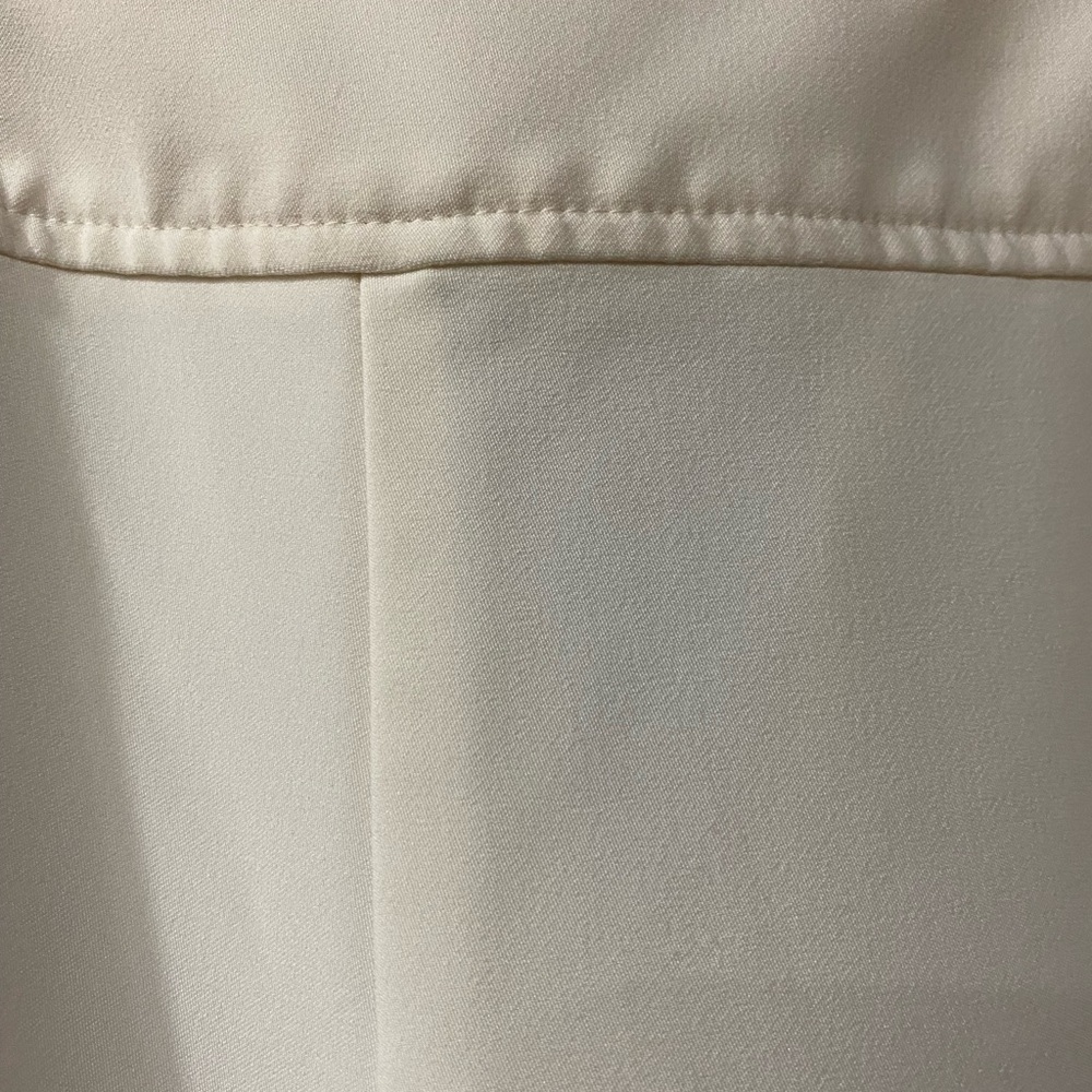 Cabi size 8 off-white wide leg dress pant.  In great condition.